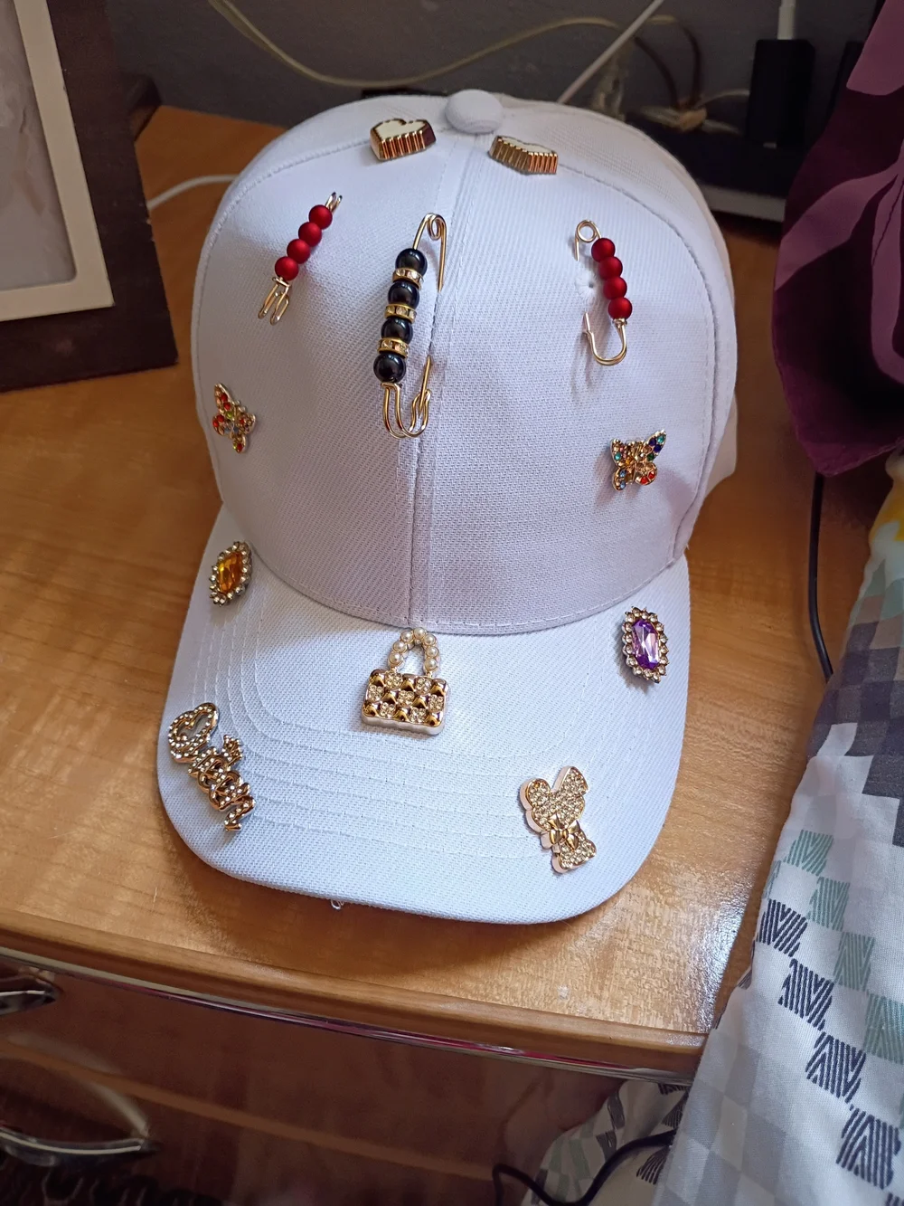 Embellished White Baseball Cap with Gem & Charm Accents